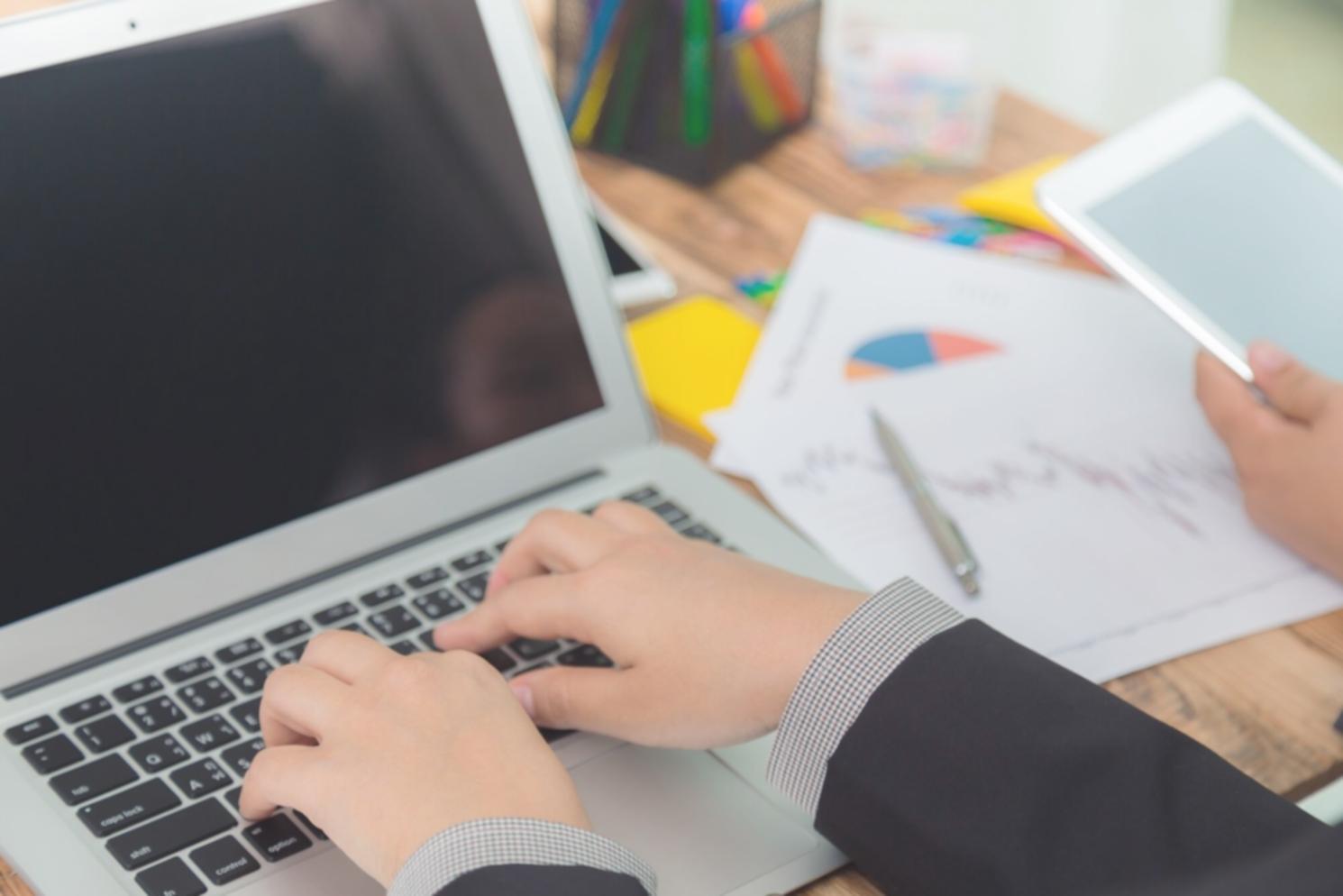 Professional analyzing financial data with modern tools and charts